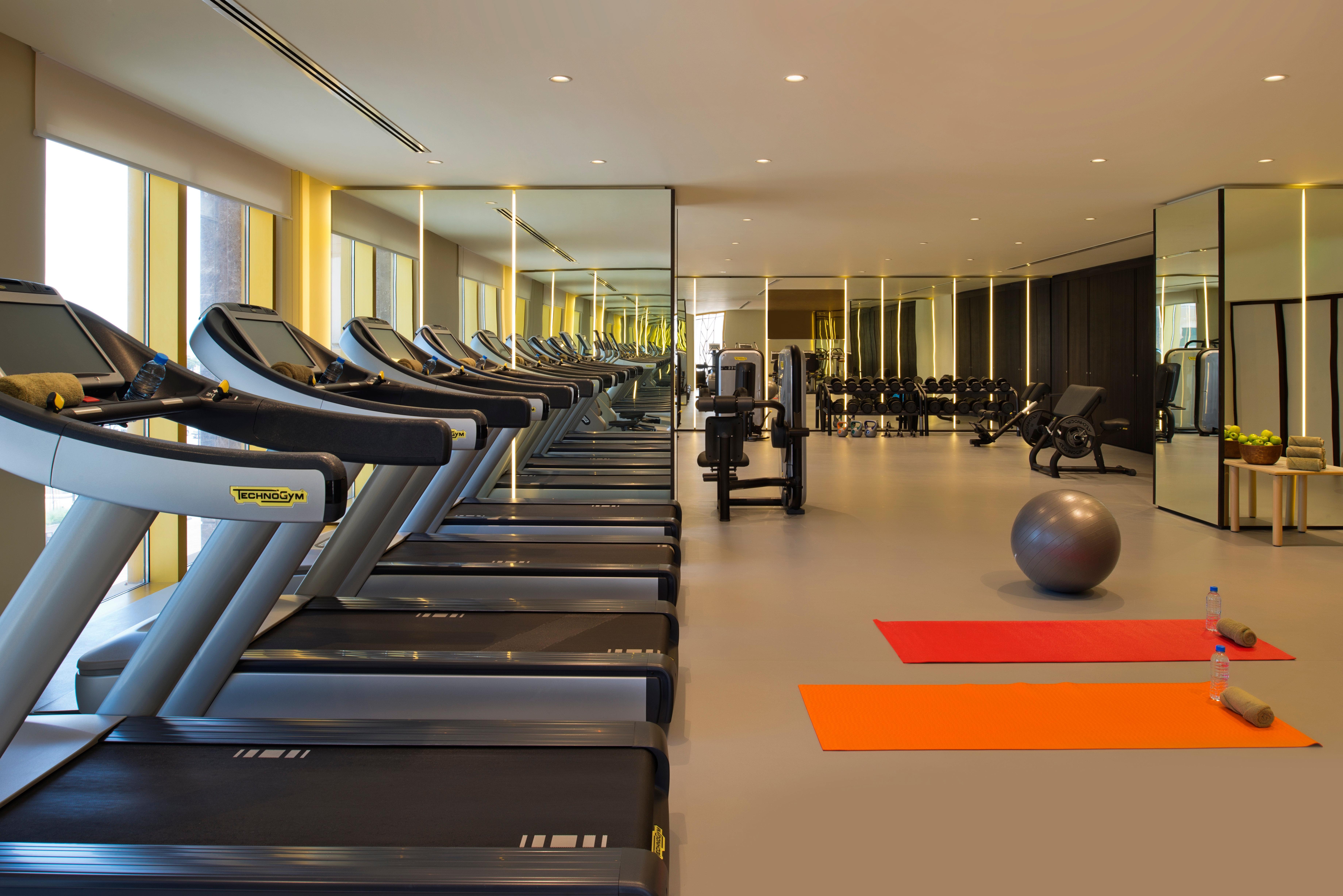Voco Doha West Bay Suites By Ihg Экстерьер фото The gym at the hotel
