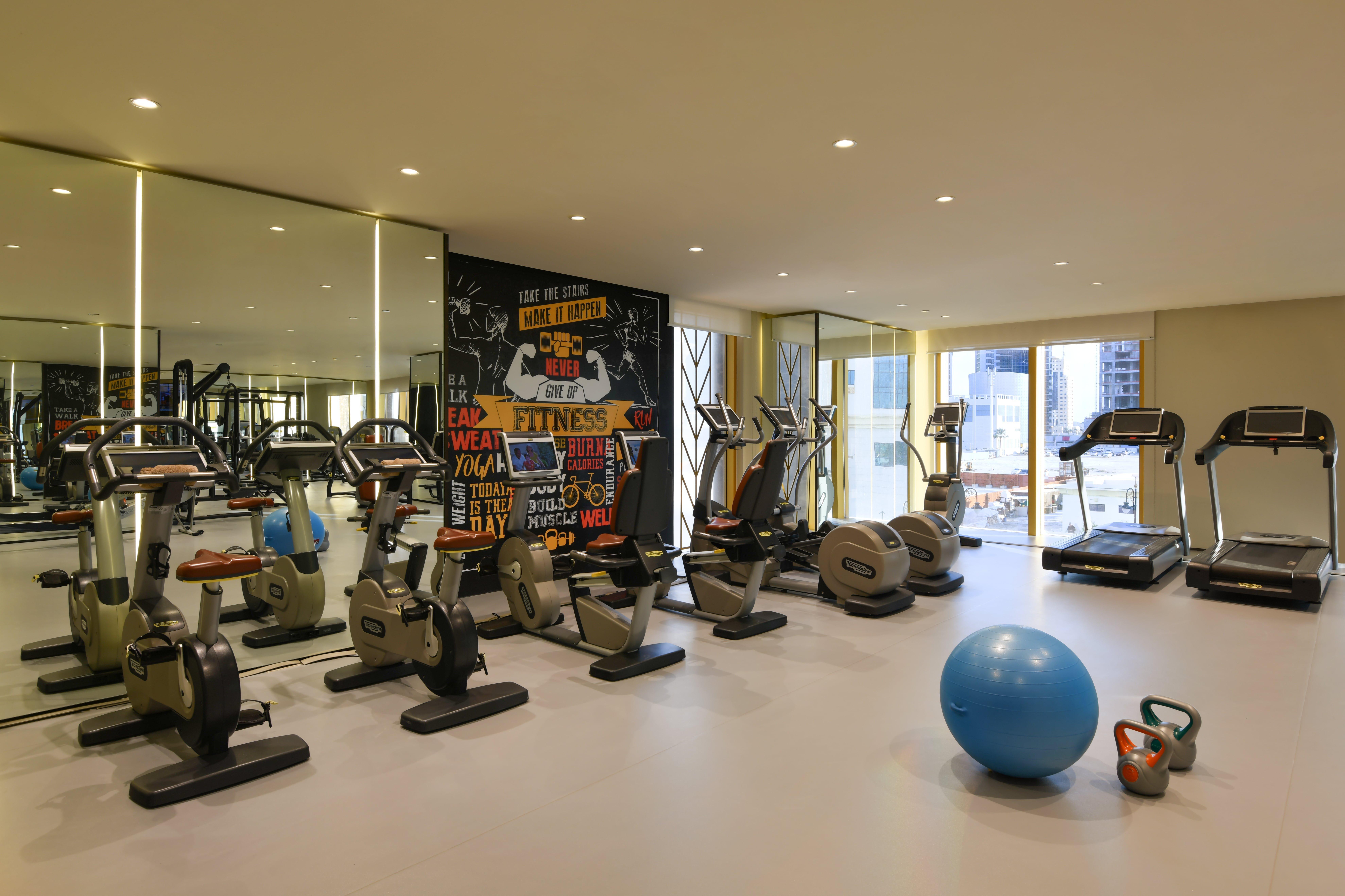 Voco Doha West Bay Suites By Ihg Экстерьер фото The gym at the hotel