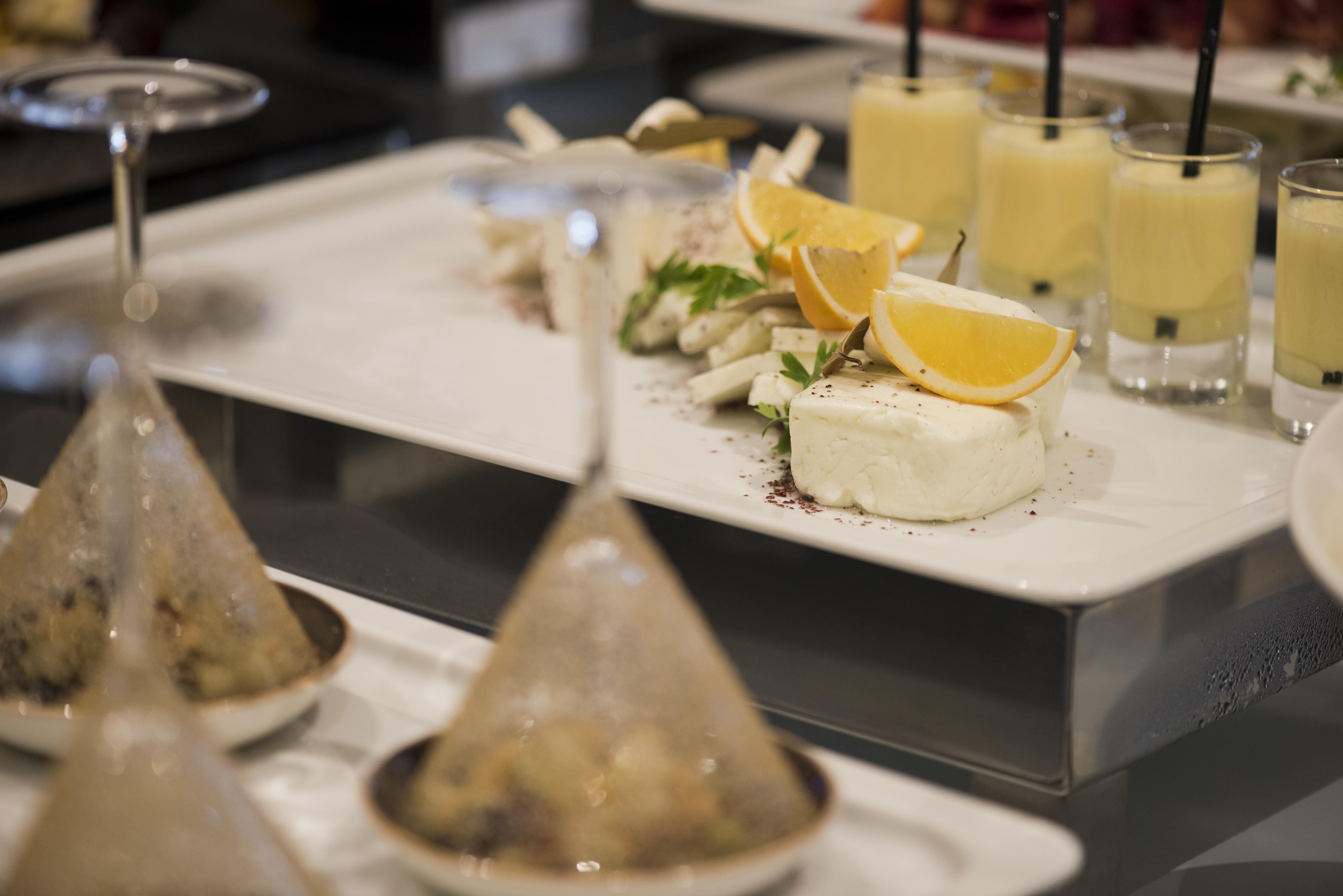 Voco Doha West Bay Suites By Ihg Экстерьер фото A selection of cheese and lemon