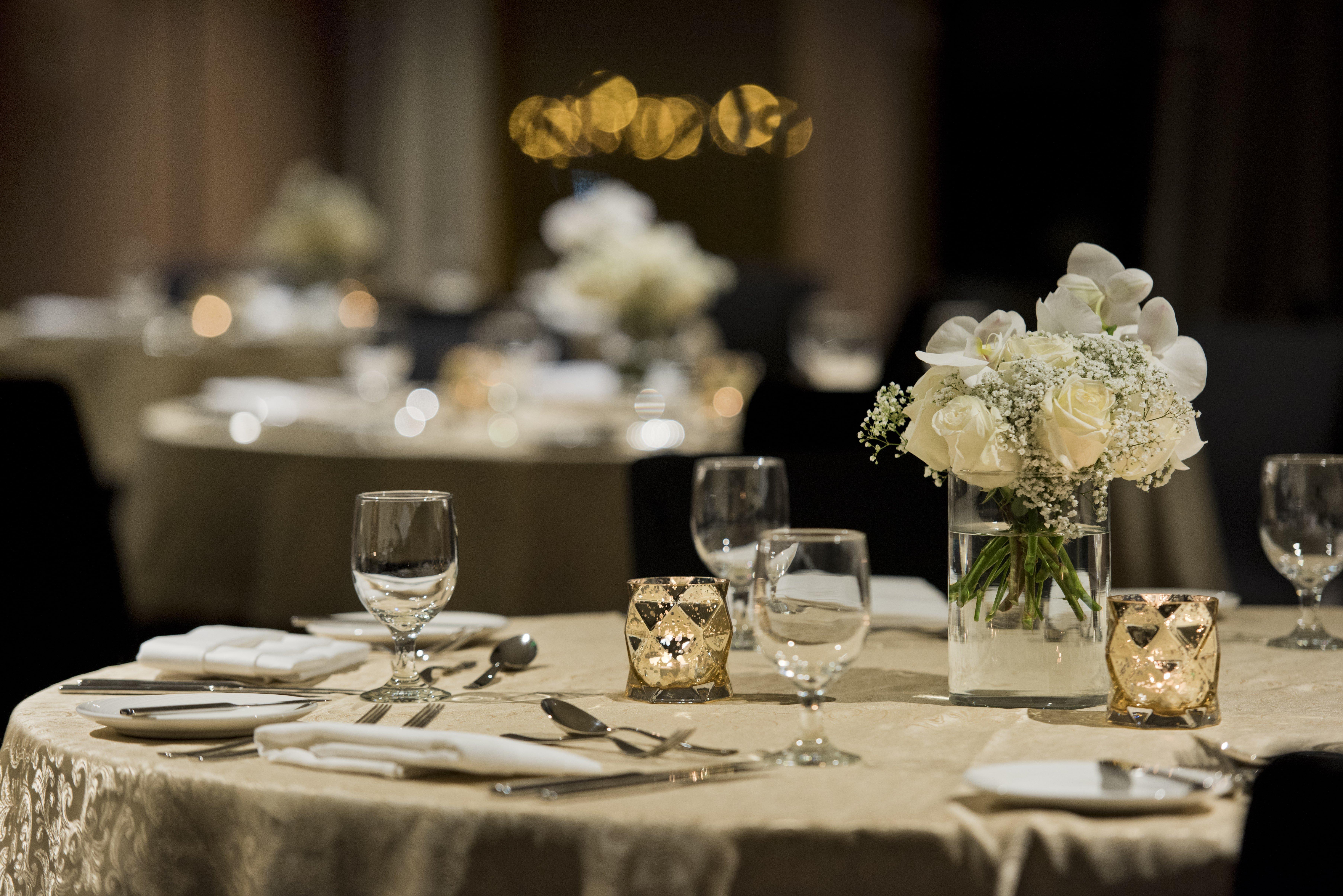 Voco Doha West Bay Suites By Ihg Экстерьер фото A table set for a formal dinner