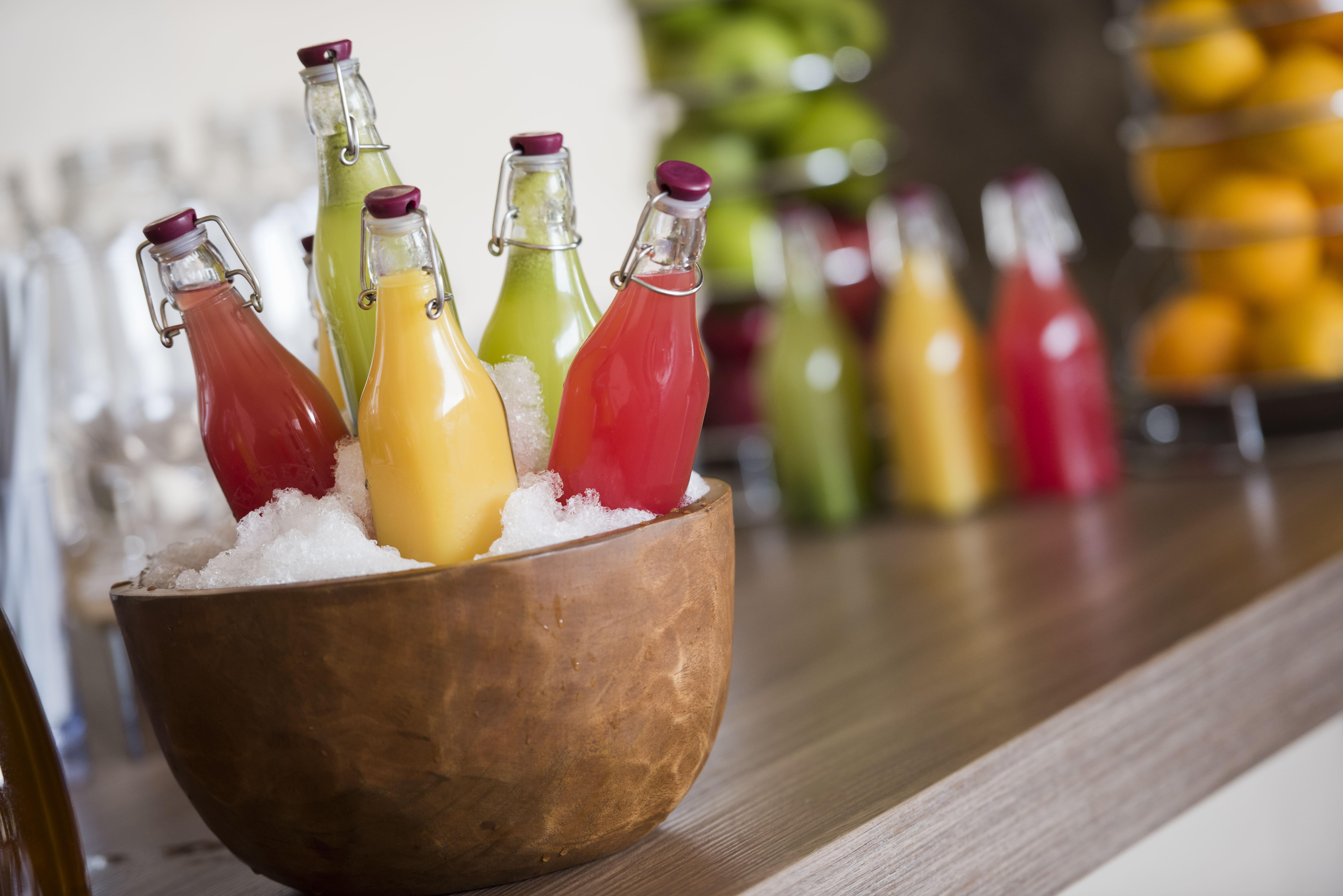 Voco Doha West Bay Suites By Ihg Экстерьер фото Bottles of juice