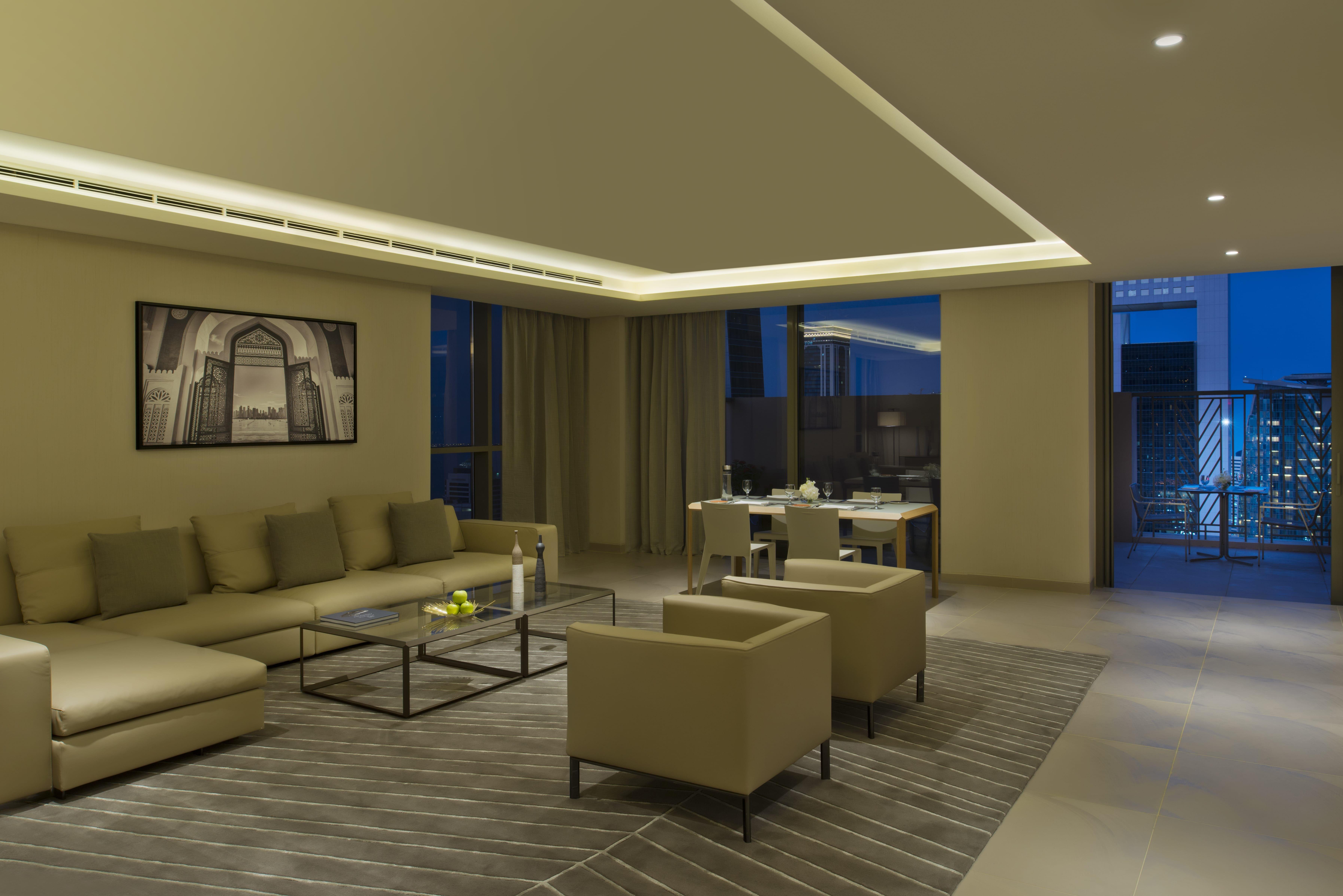 Voco Doha West Bay Suites By Ihg Экстерьер фото A living room in a typical apartment